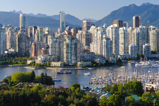 The City of Vancouver skyline showing false creek, downtown and the mountains