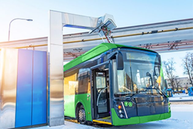 What are carbon markets? An example of an electric bus being charged at a charging station