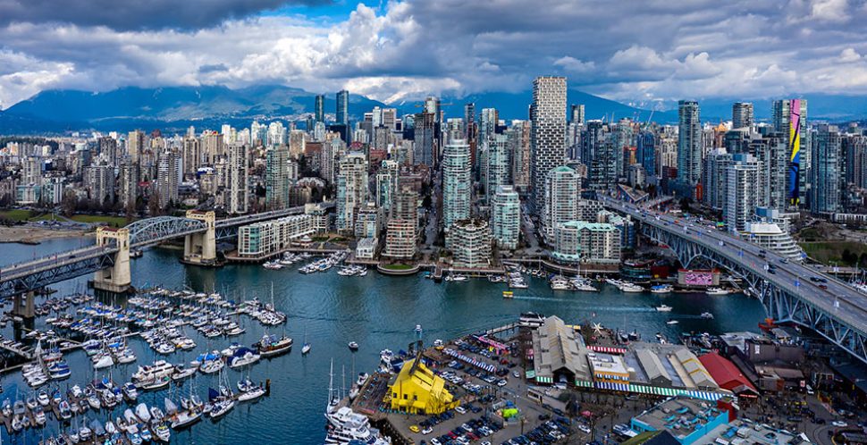 What is economic development? A shot of downtown Vancouver from false creek and Granville island