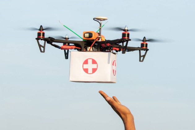 Photo of a woman releasing a drone carrying medical supplies demonstrating future potential for advanced air mobility in Vancouver